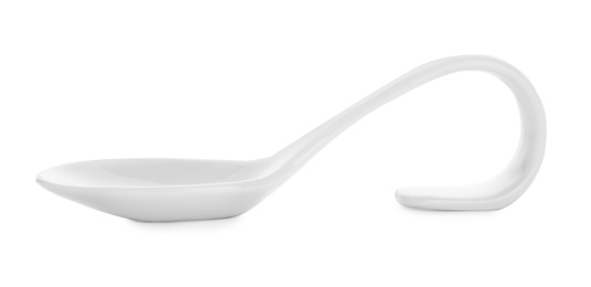 Photo of Clean empty ceramic appetizer spoon on white background