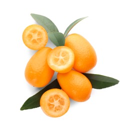 Photo of Fresh ripe kumquats with green leaves on white background, top view