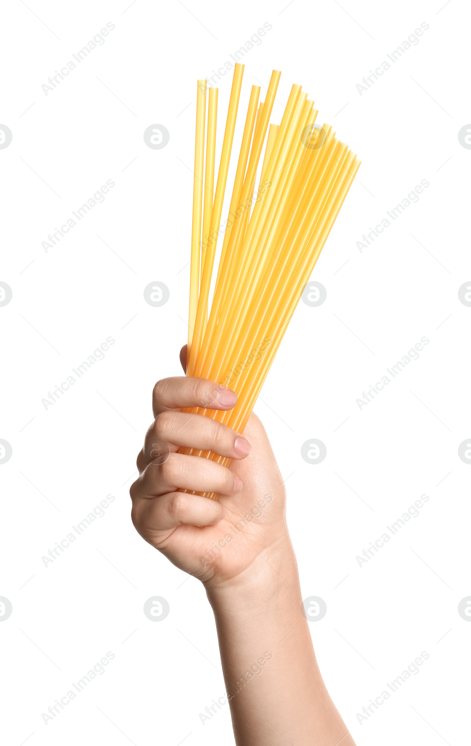 Photo of Woman holding bunch of plastic straws on white background, closeup