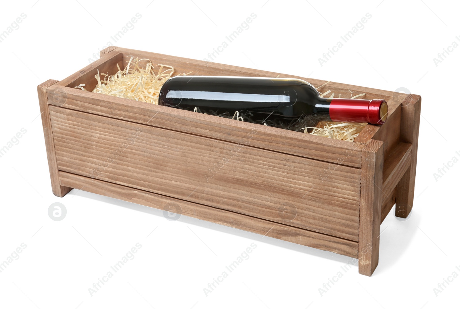 Photo of Open wooden crate with bottle of wine isolated on white