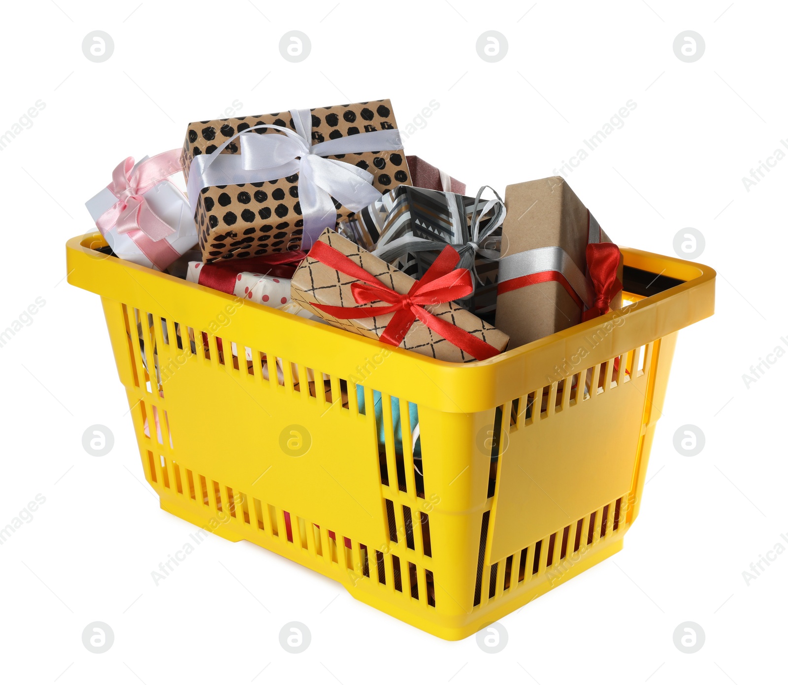 Photo of Shopping basket full of gift boxes on white background