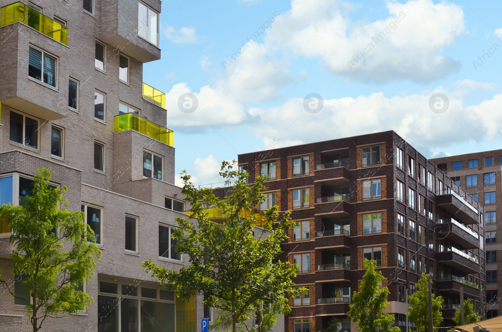 Photo of Beautiful view of modern buildings in city on sunny day