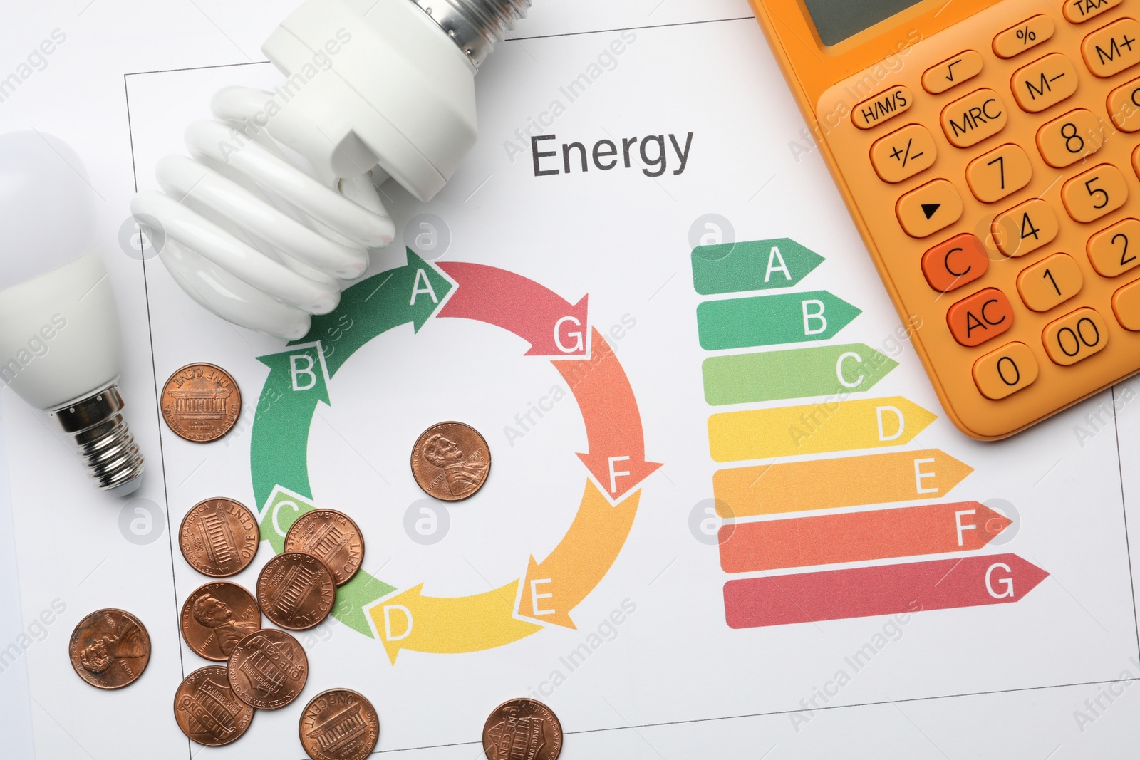 Photo of Flat lay composition with energy efficiency rating chart and calculator on white background