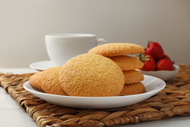 Photo of Delicious Danish butter cookies on table, closeup