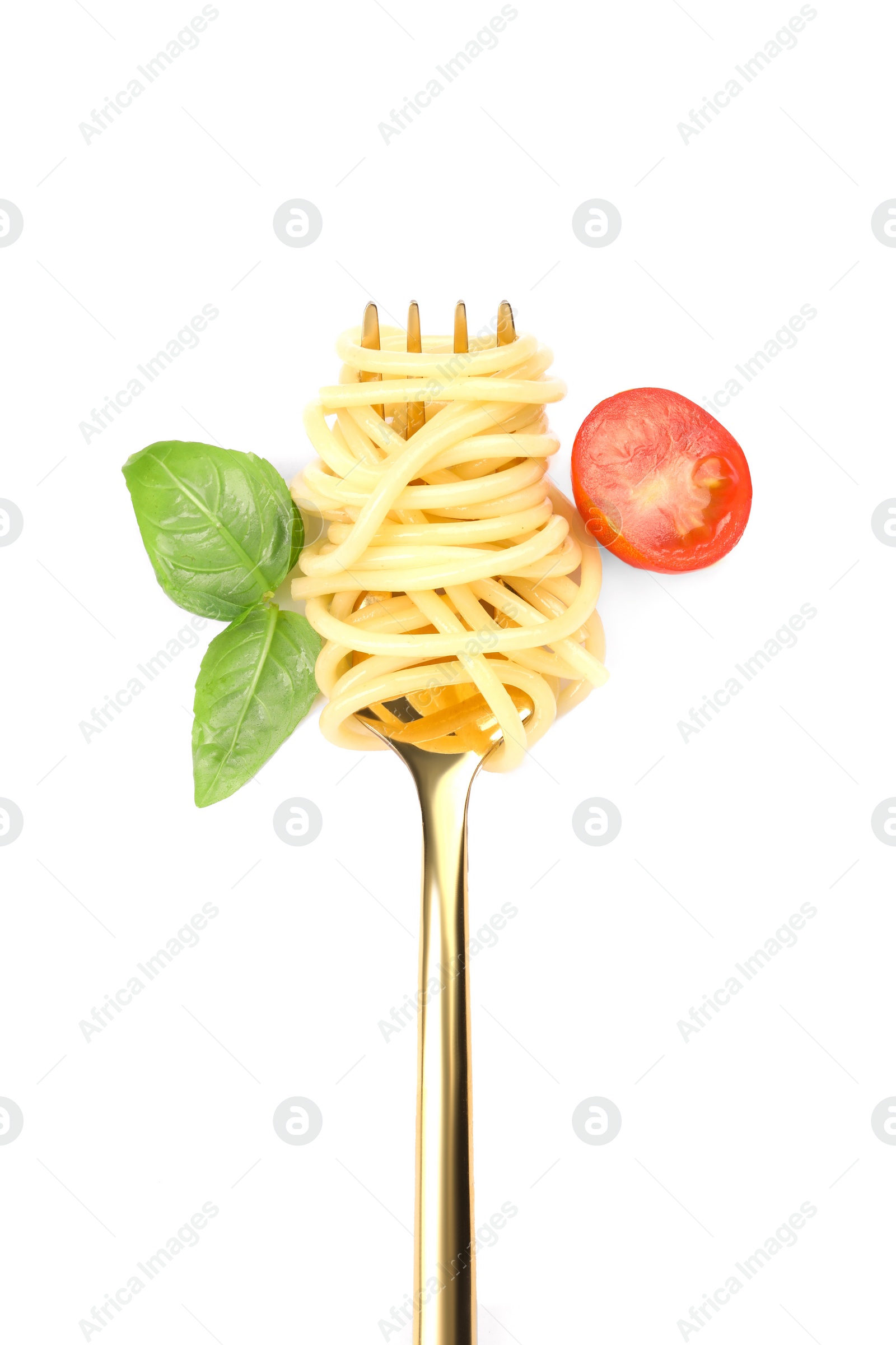 Photo of Fork with tasty pasta, fresh tomato and basil isolated on white, top view