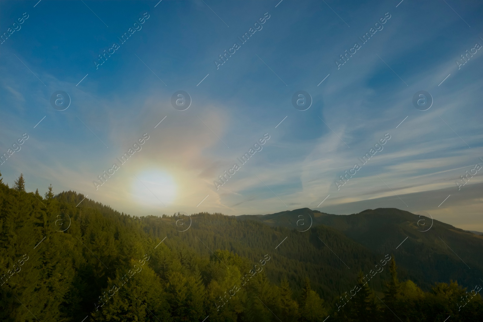 Image of Aerial view of beautiful mountain landscape with green trees in morning