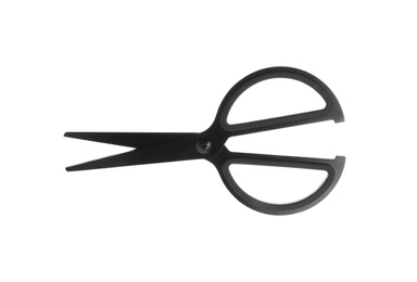 Photo of Pair of sharp scissors on white background