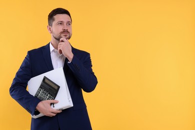 Photo of Thoughtful accountant with calculator and folder on yellow background. Space for text