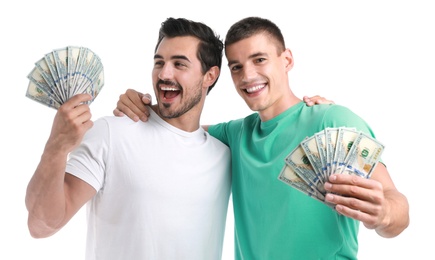 Photo of Handsome young men with dollars on white background