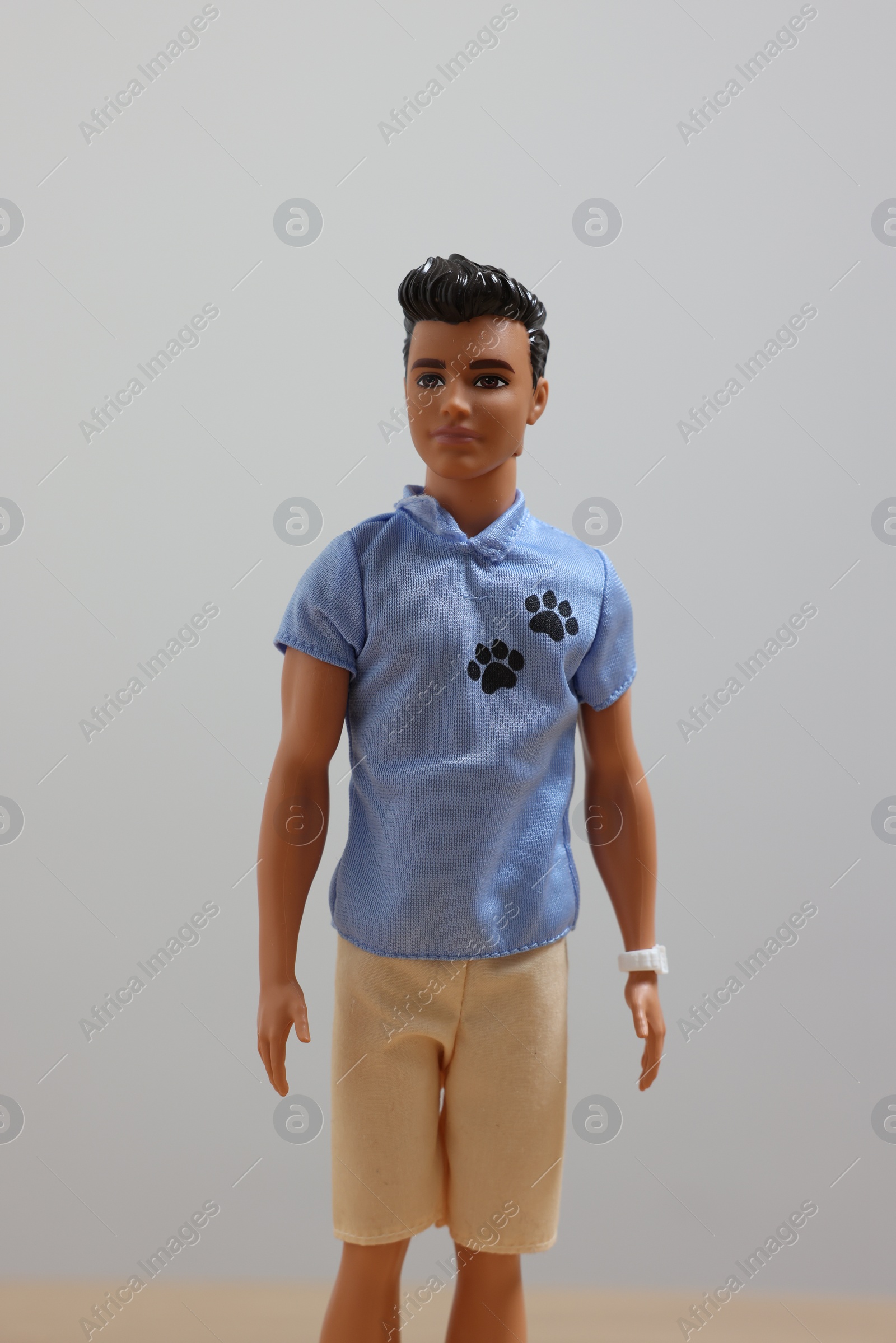 Photo of Leiden, Netherlands - September 20, 2023: Stylish Ken doll on light gray background