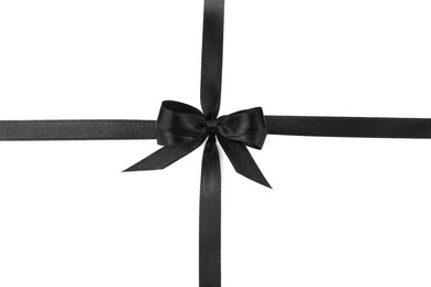 Photo of Elegant black ribbon with bow isolated on white, top view