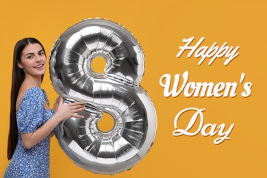 Image of Happy Women's Day - March 8. Attractive lady holding foil balloon in shape of number 8 on orange background