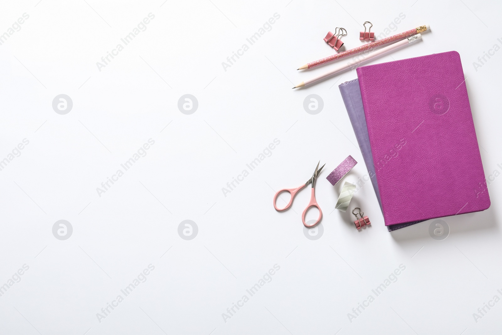 Photo of Composition with scissors and stationery on white background, top view