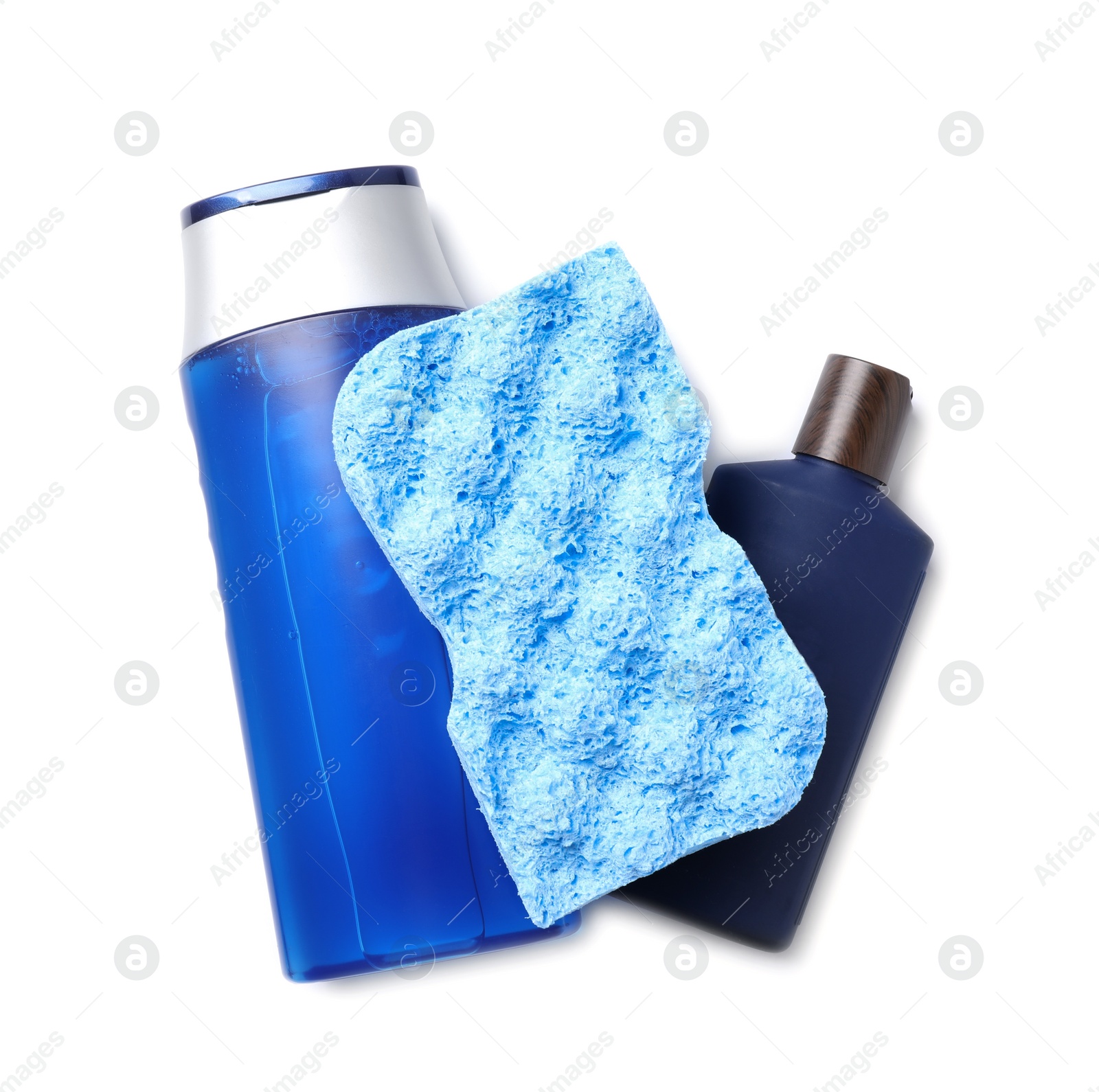 Photo of Bottles and bast wisp isolated on white, top view. Men's cosmetics