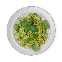 Delicious pasta with pesto sauce and basil isolated on white, top view