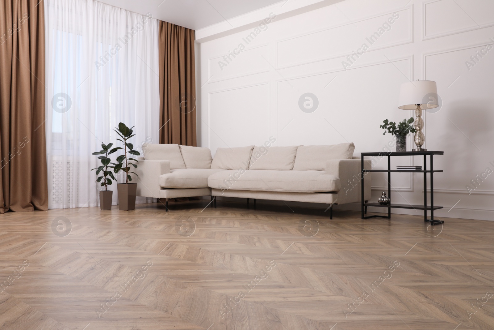 Photo of Modern living room with parquet flooring and stylish furniture