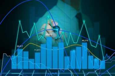 Image of Businessman drawing growth graph on virtual screen, closeup. Investment concept