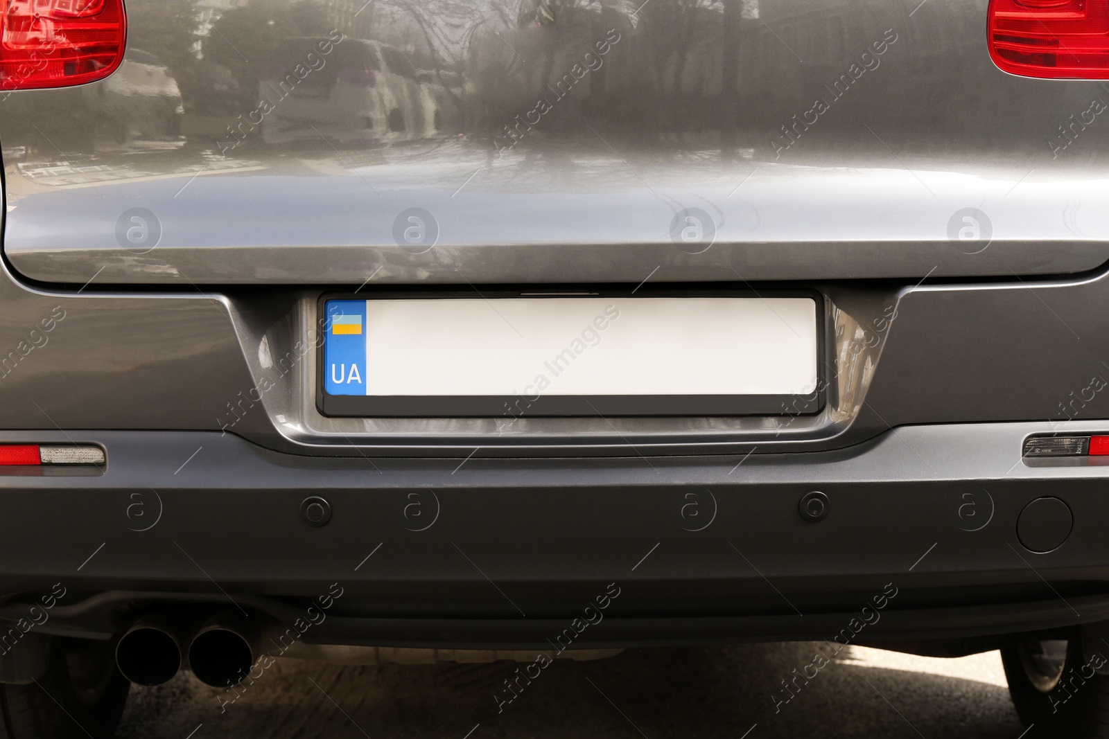 Photo of Car with vehicle registration plate outdoors, closeup