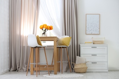 Photo of Beautiful curtains on window in stylish room interior