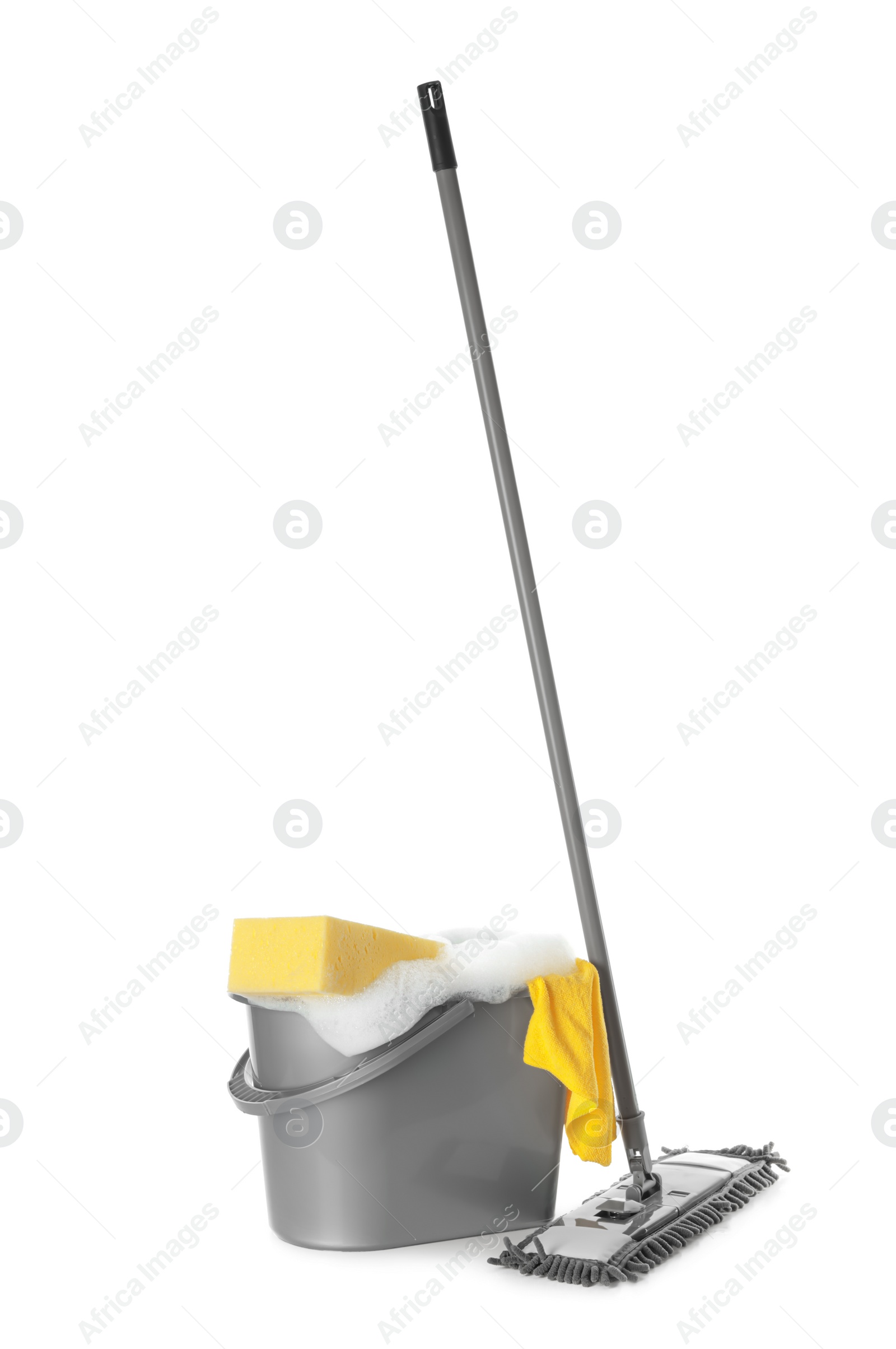 Photo of Plastic bucket with foam and cleaning supplies on white background