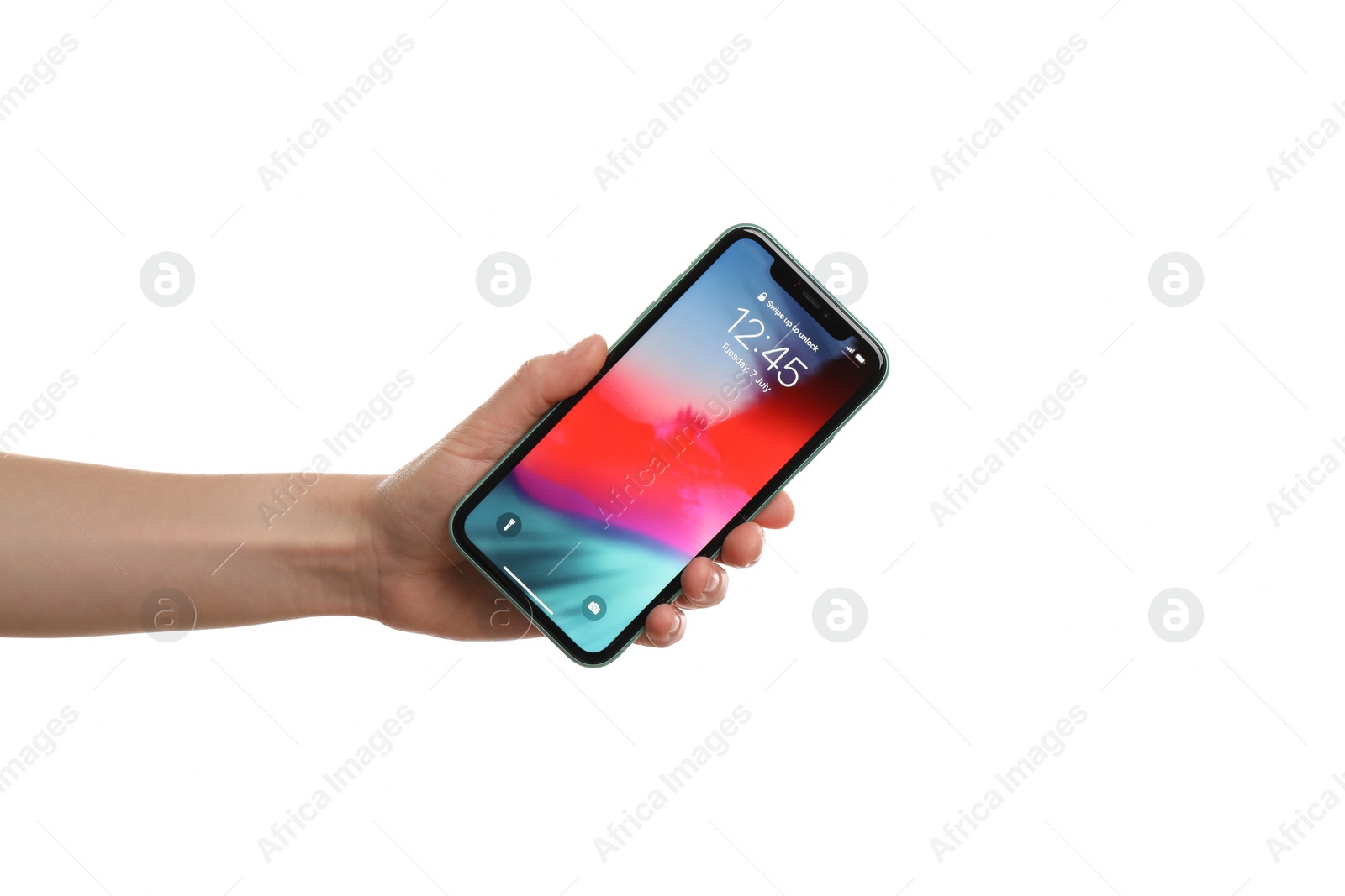 Photo of MYKOLAIV, UKRAINE - JUNE 9, 2020: Woman holding  iPhone X with locked screen on white background, closeup