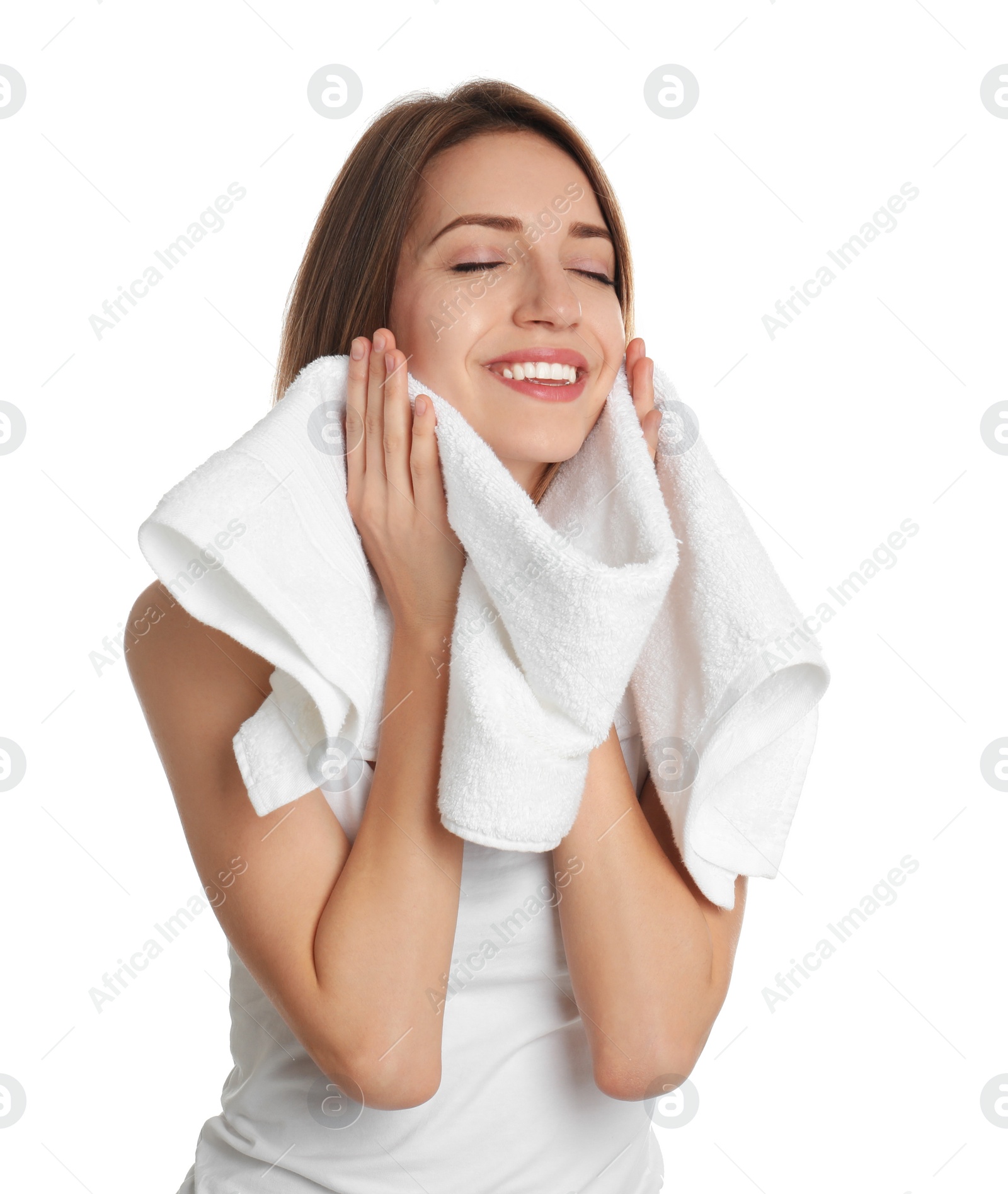 Photo of Young woman wiping face with towel on white background