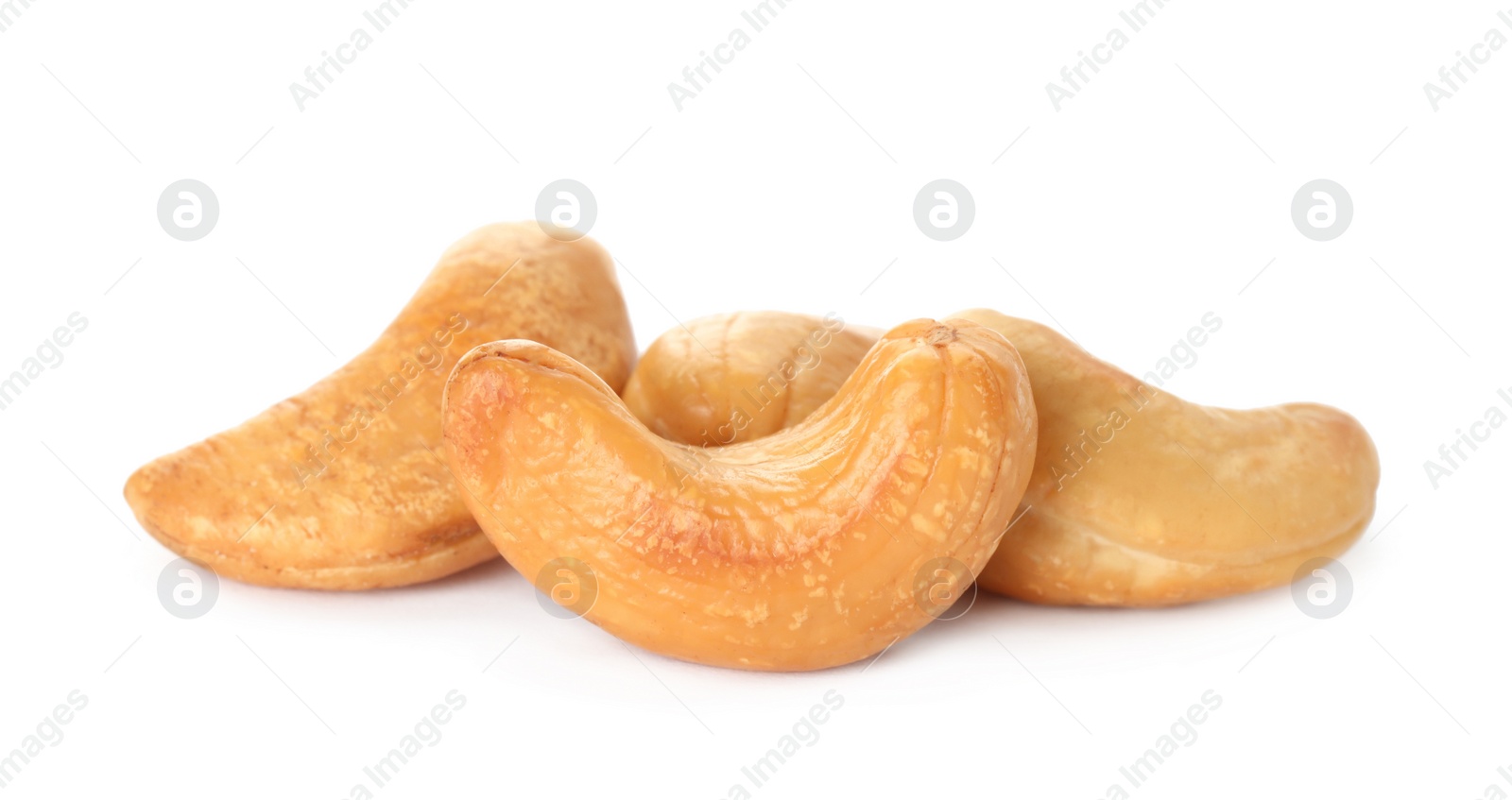 Photo of Pile of tasty organic cashew nuts isolated on white