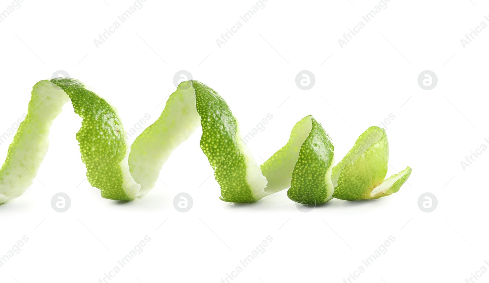 Photo of Peel of fresh ripe lime on white background