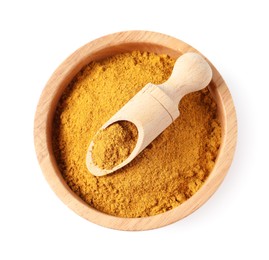 Photo of Dry curry powder in bowl and scoop isolated on white, top view