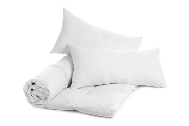 Photo of Soft blanket and pillows on white background