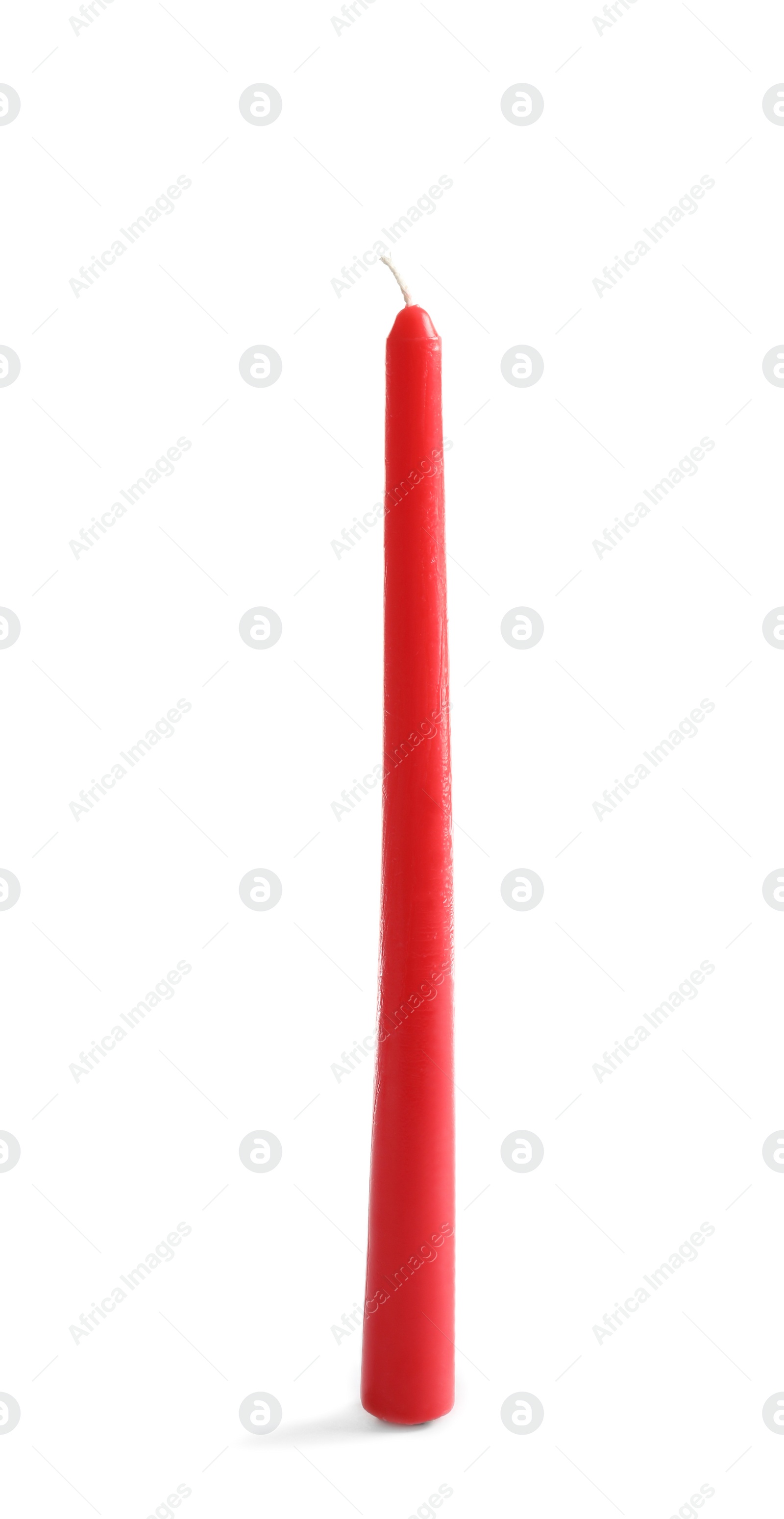 Photo of Red thin wax candle on white background