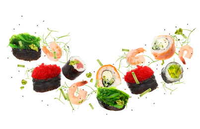 Image of Delicious sushi rolls and ingredients on white background