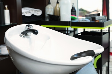 Hair washing sink in modern beauty salon