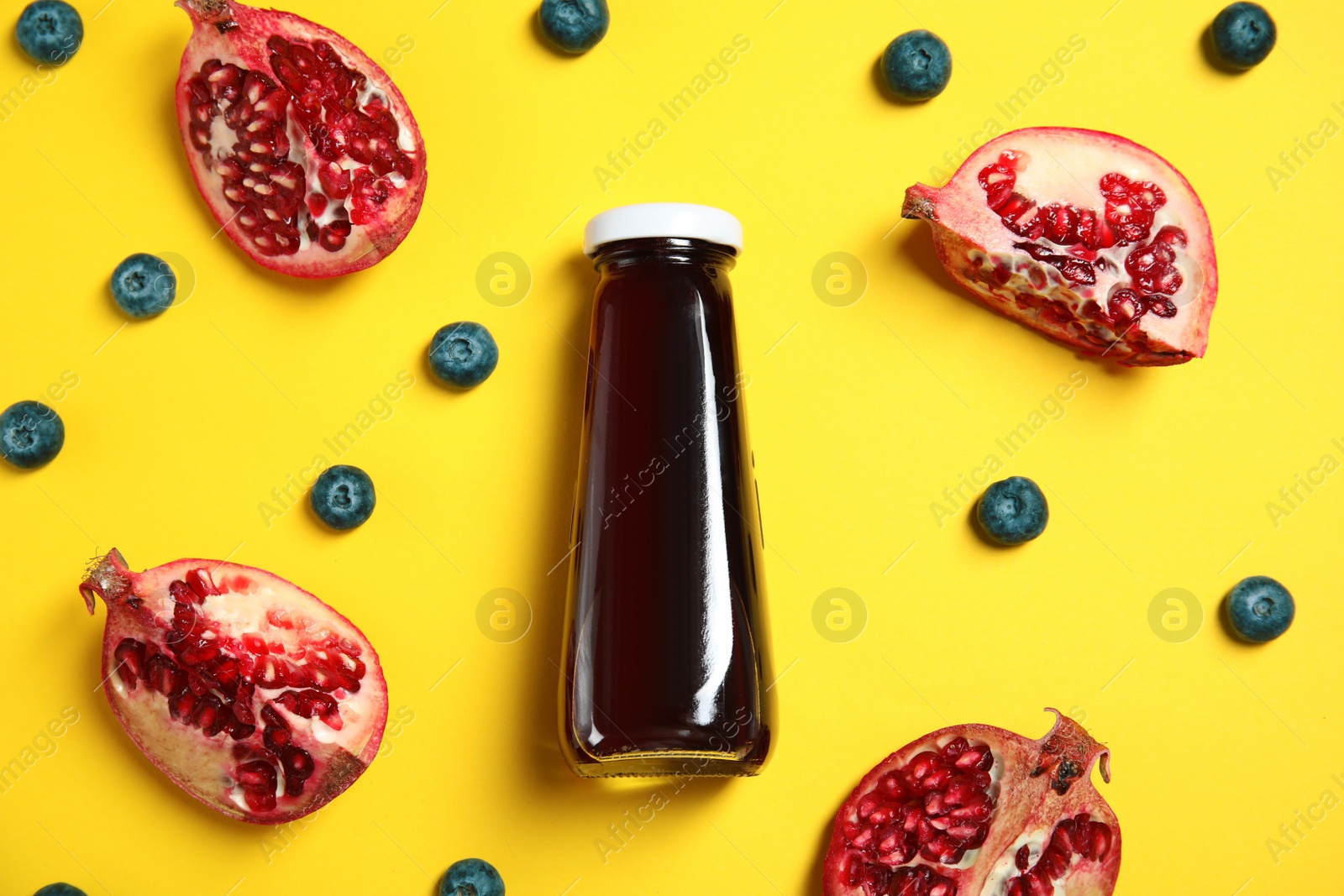 Photo of Flat lay composition with juice in bottle and ingredients on color background