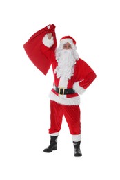 Photo of Man in Santa Claus costume with bag posing on white background