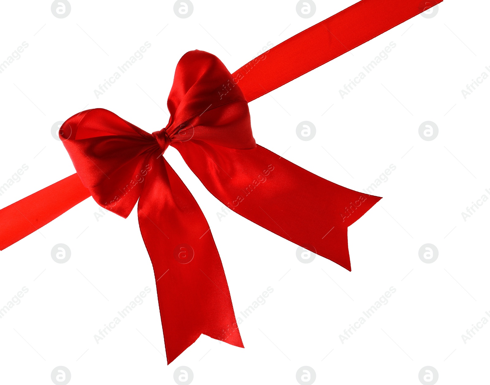 Photo of Red ribbon with bow on white background. Festive decoration