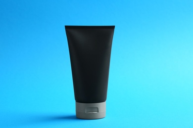 Photo of Men's cosmetic product on color background. Mockup for design