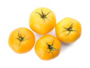 Photo of Delicious ripe yellow tomatoes isolated on white, top view