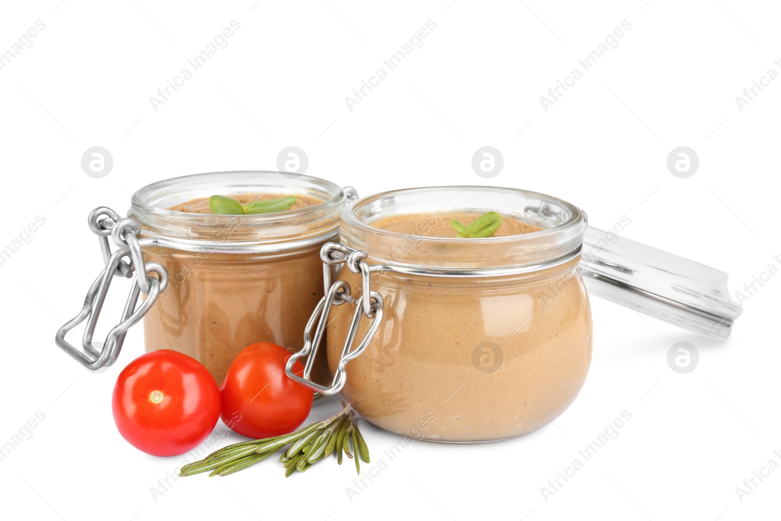 Photo of Glass jars with delicious liver pate on white background