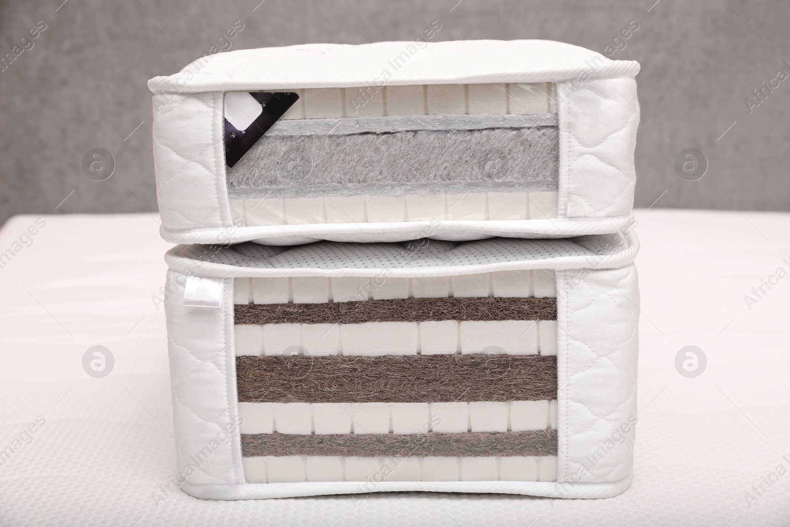 Image of Samples of modern orthopedic mattress on textile