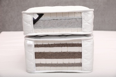 Samples of modern orthopedic mattress on textile