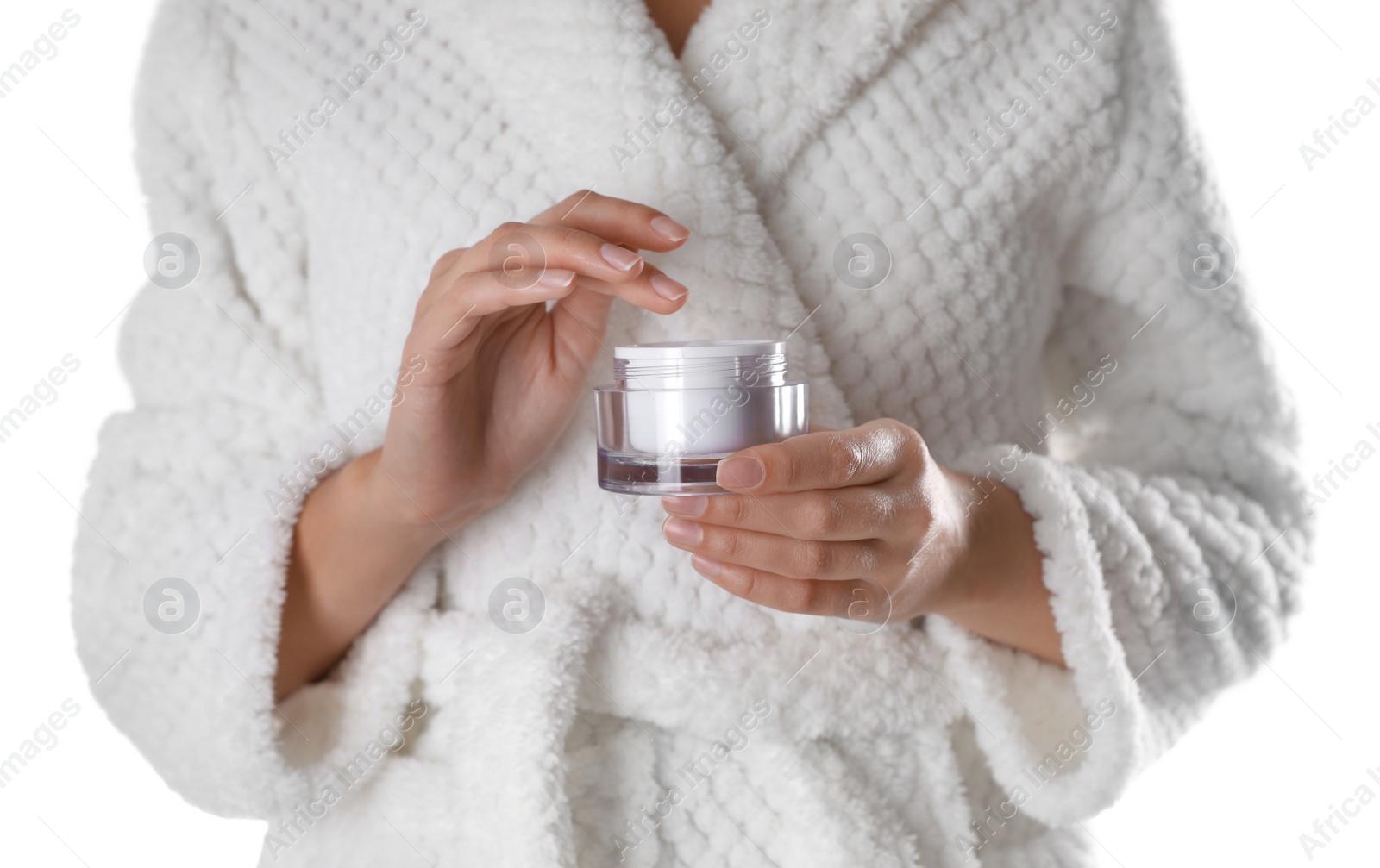 Photo of Woman with jar of moisturizing cream on white background, closeup