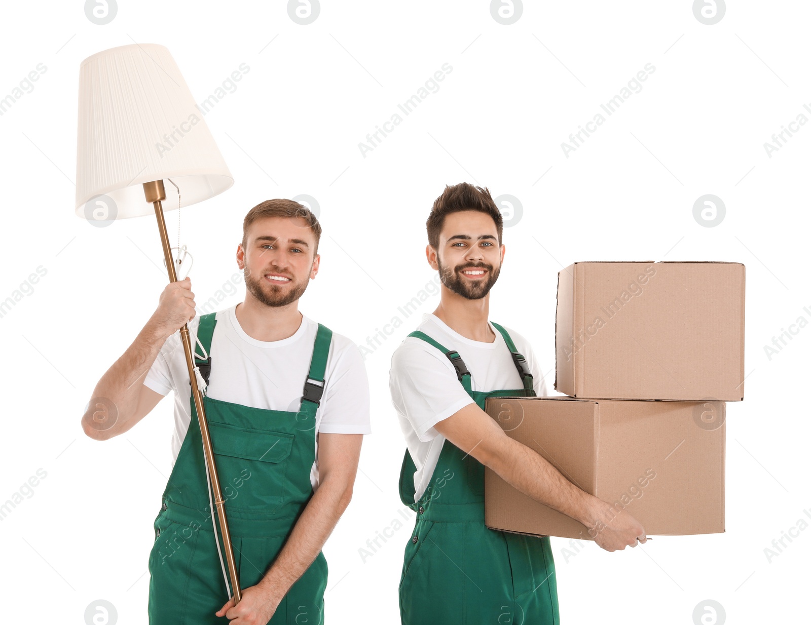 Photo of Young workers carrying stuff isolated on white. Moving service