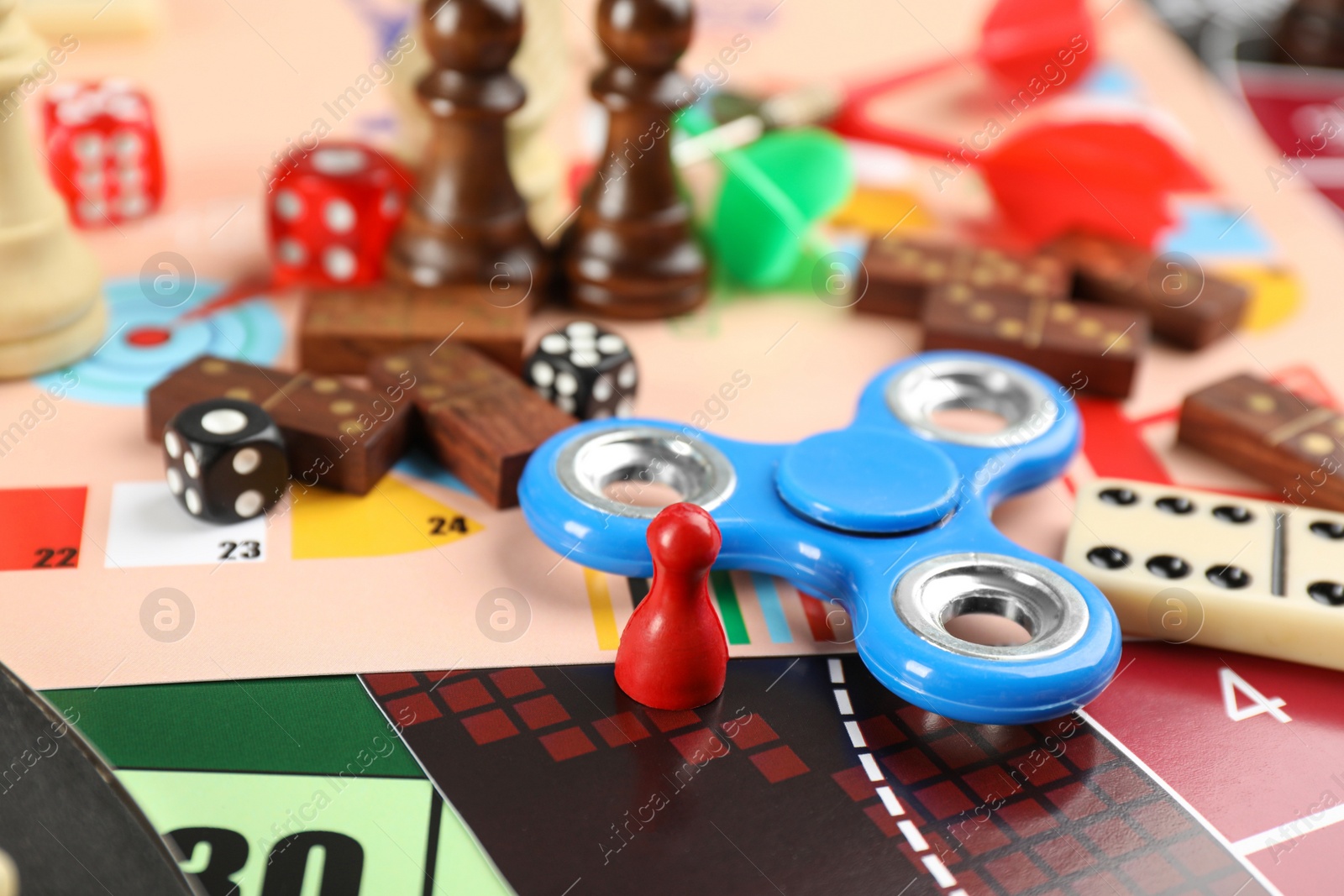 Photo of Different types of board games as background, closeup