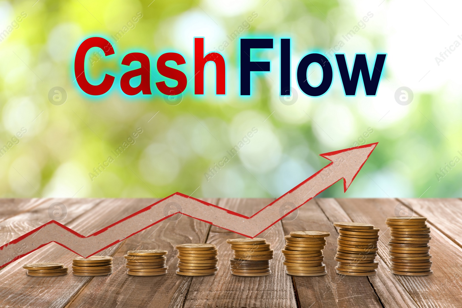 Image of Cash Flow concept. Illustration of upward arrow and stacked coins on wooden table against blurred green background