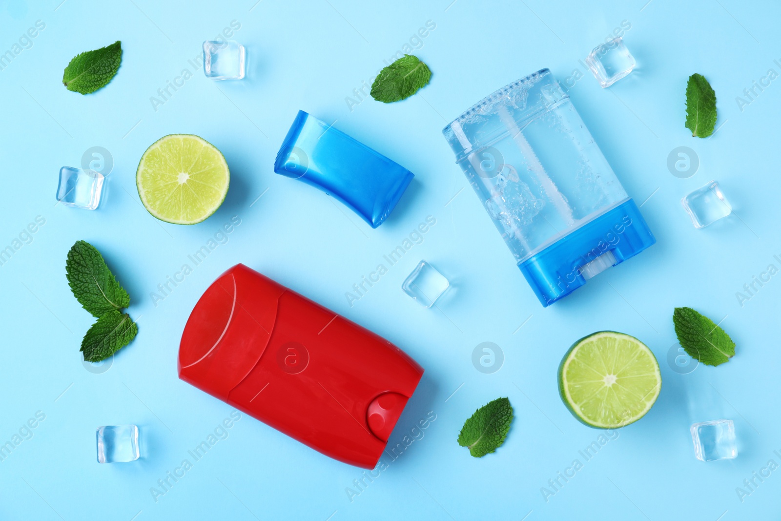 Photo of Flat lay composition with natural male deodorants on light blue background