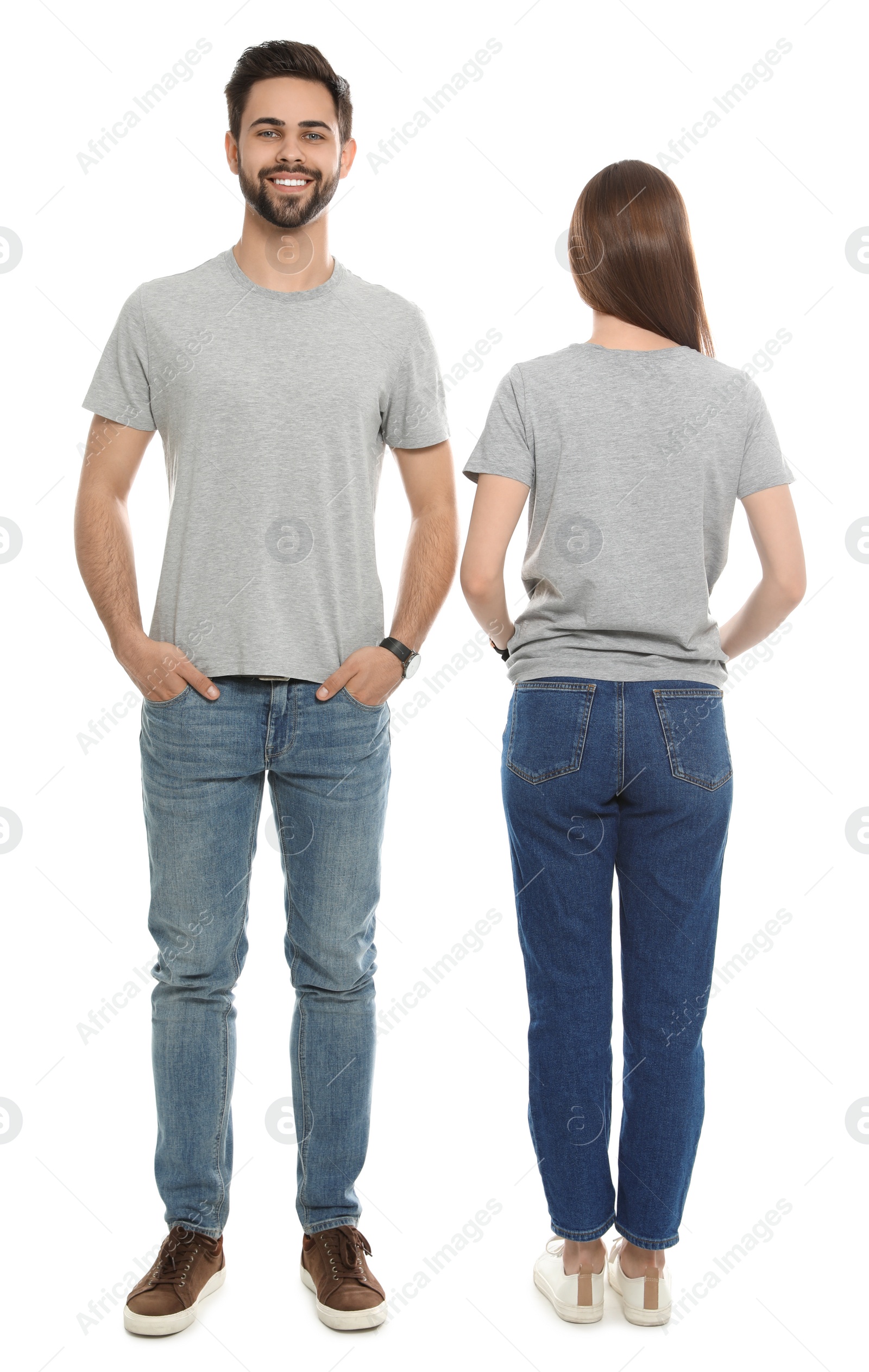 Photo of Young people in t-shirts on white background. Mock up for design