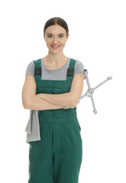 Portrait of professional auto mechanic with lug wrench and rag on white background