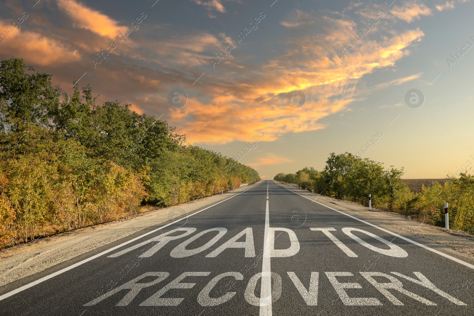 Image of Start to live without alcohol addiction. Phrase ROAD TO RECOVERY on asphalt highway