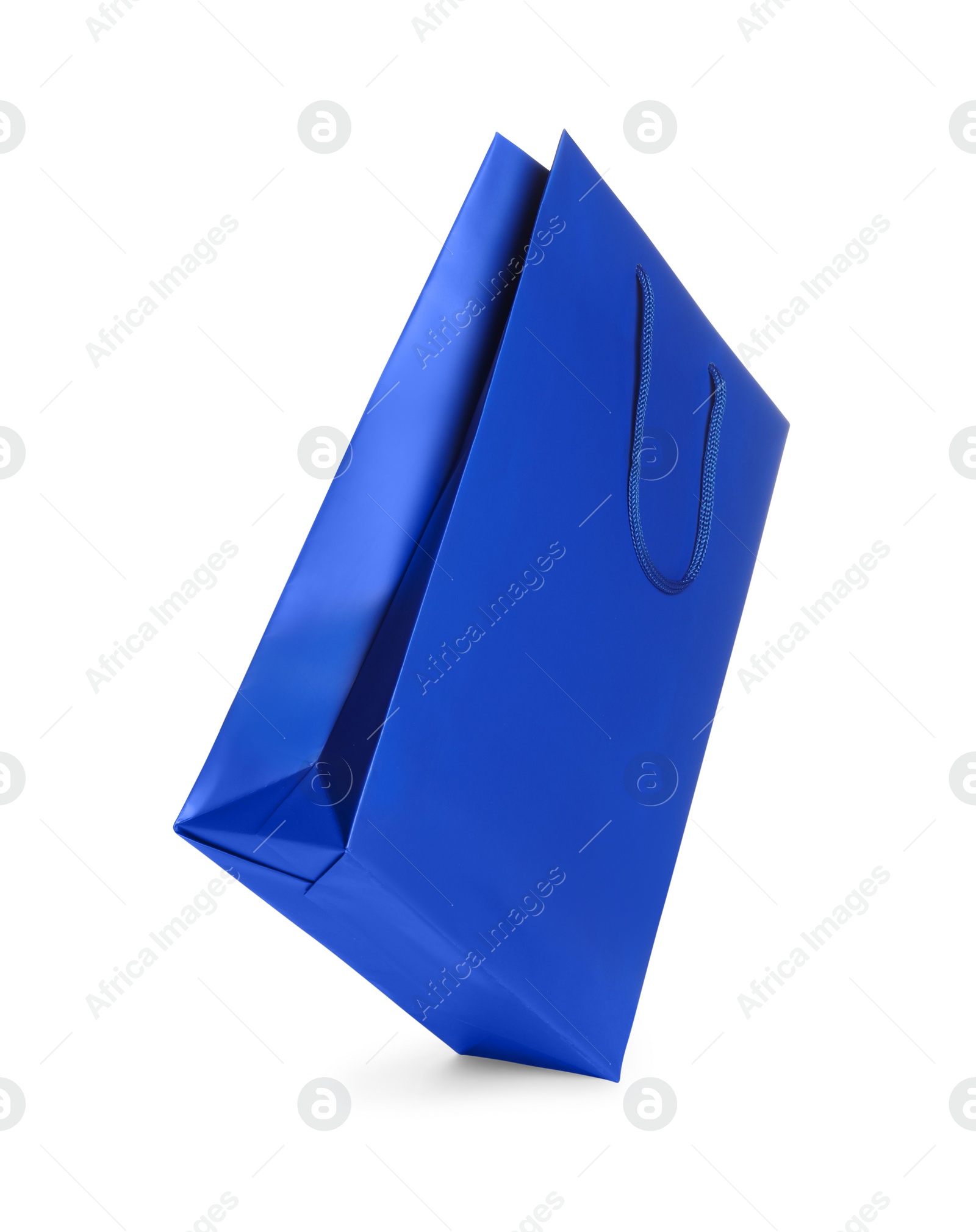 Photo of One blue shopping bag isolated on white